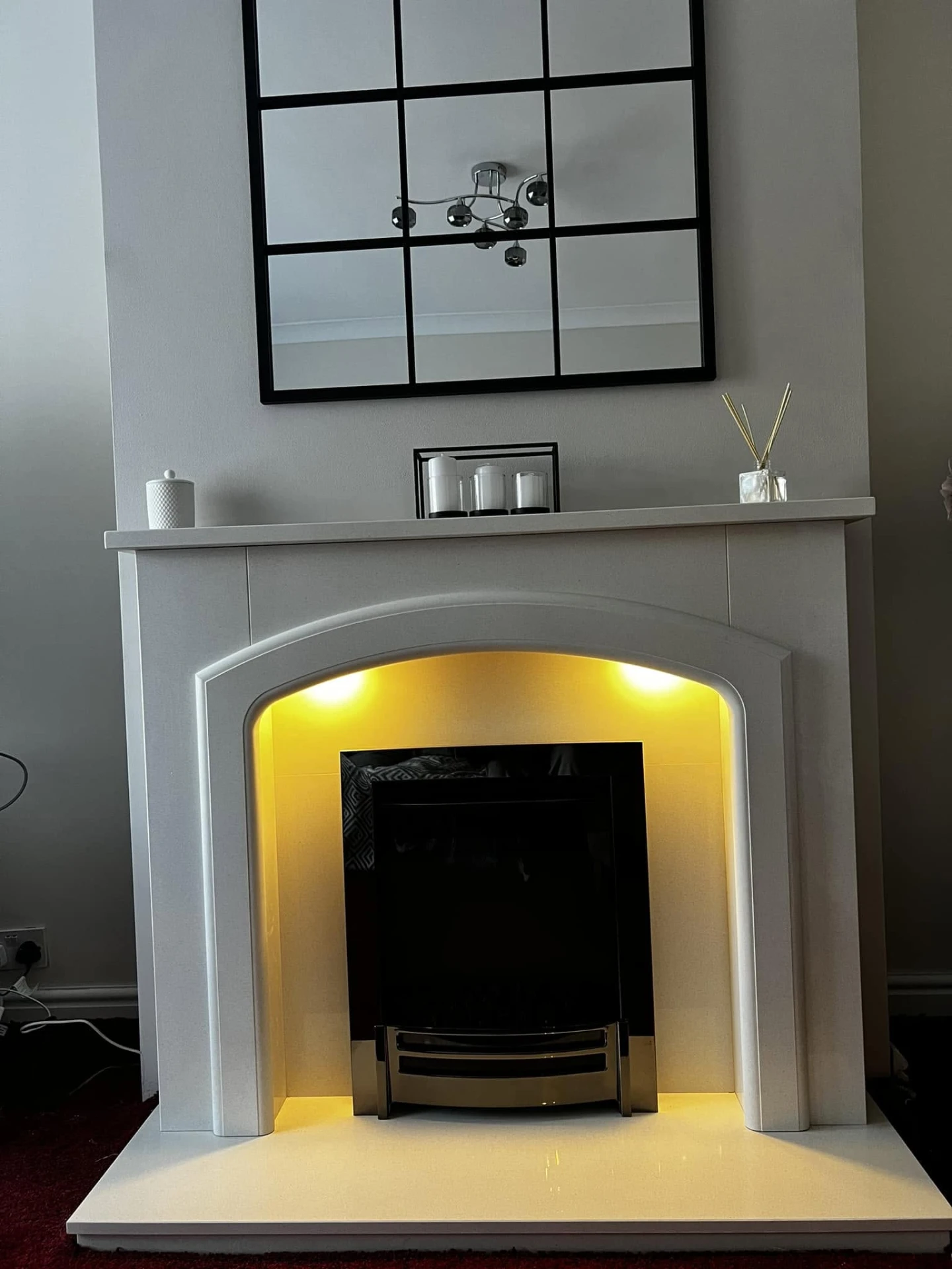 Gas fire and surround installed in a living room